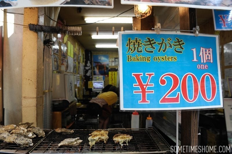 Best Thing I Ever Ate by Sometimes Home travel blog. Photos of a macaroni and cheese baked oyster in Miyajima Island, Japan.