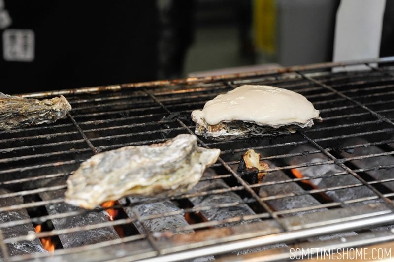 Best Thing I Ever Ate by Sometimes Home travel blog. Photos of a macaroni and cheese baked oyster in Miyajima Island, Japan.