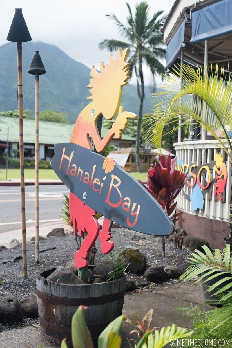 What to do and see in north Kauai, Hawaii, Hanalei Bay Kokopelli sign photo on Sometimes Home travel blog by Mikkel Paige.