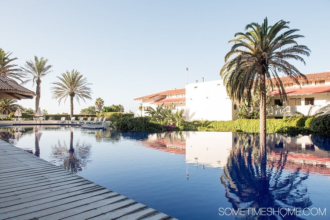 The best photo location in Rosarito Beach, Mexico. This beautiful beach city is in the Baja California peninsula south of San Diego. It's a great day trip that offers sunsets, ocean views and great hotels, resorts and spas. Click through to see what hotel has this incredible pool view! #RosaritoBeach #BajaCalifornia #SanDiegoDayTrip #RosaritoMexico #Mexico #RosaritoBeachHotel