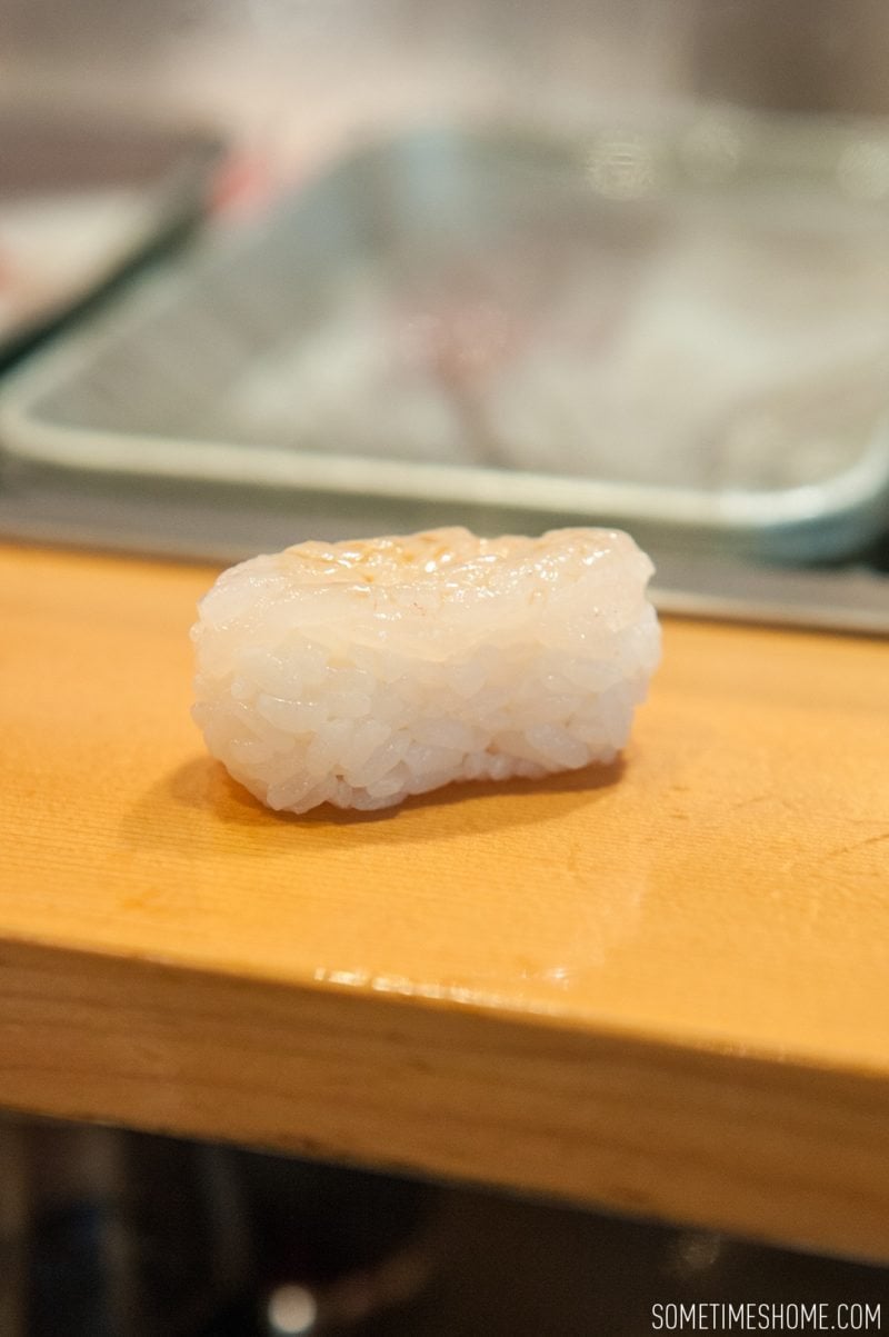 Sushi Dai Restaurant at Tsukiji Fish Market in Tokyo Japan. Photos on Sometimes Home travel blog with a picture of baby shrimps sushi.