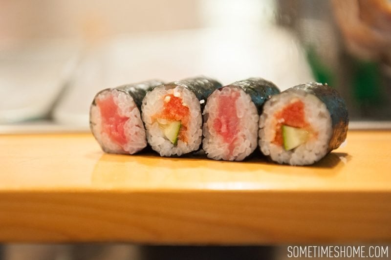 Sushi Dai Restaurant at Tsukiji Fish Market in Tokyo Japan. Photos on Sometimes Home travel blog with a picture of maki of cod eggs and tuna.