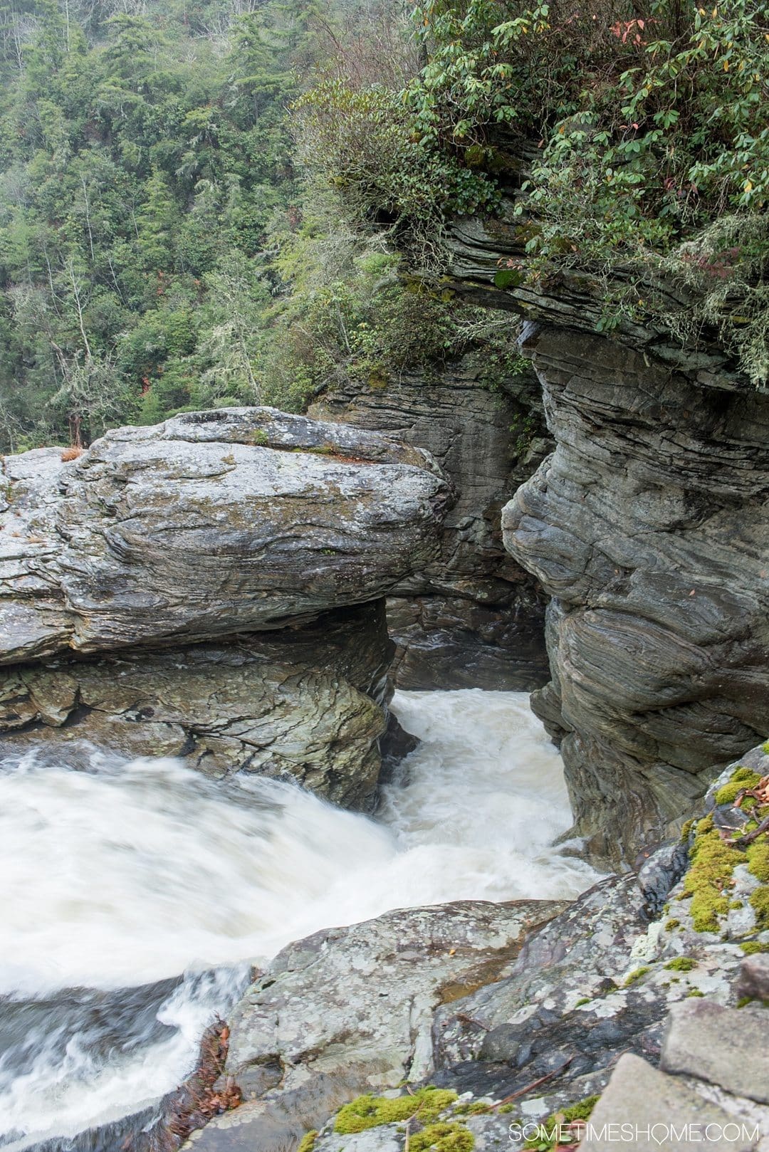 What to do on a rainy day in Boone, NC. Photos and activities on Sometimes Home travel blog. Picture of a waterfall at Linville Falls park.