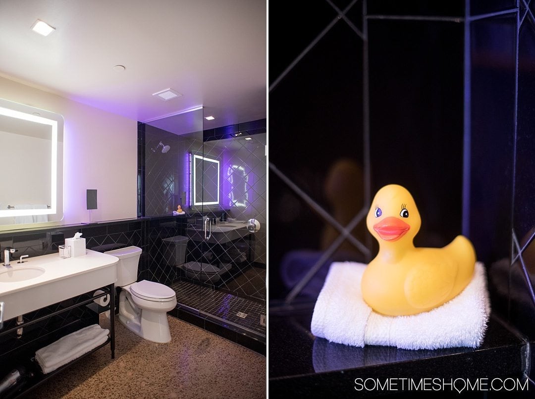 10 Reasons We Love 21c Museum Hotel in Durham NC and You Will Too including location in downtown Durham. Photos and information on Sometimes Home travel blog including hotel room sleek black bathroom design and rubber duck.