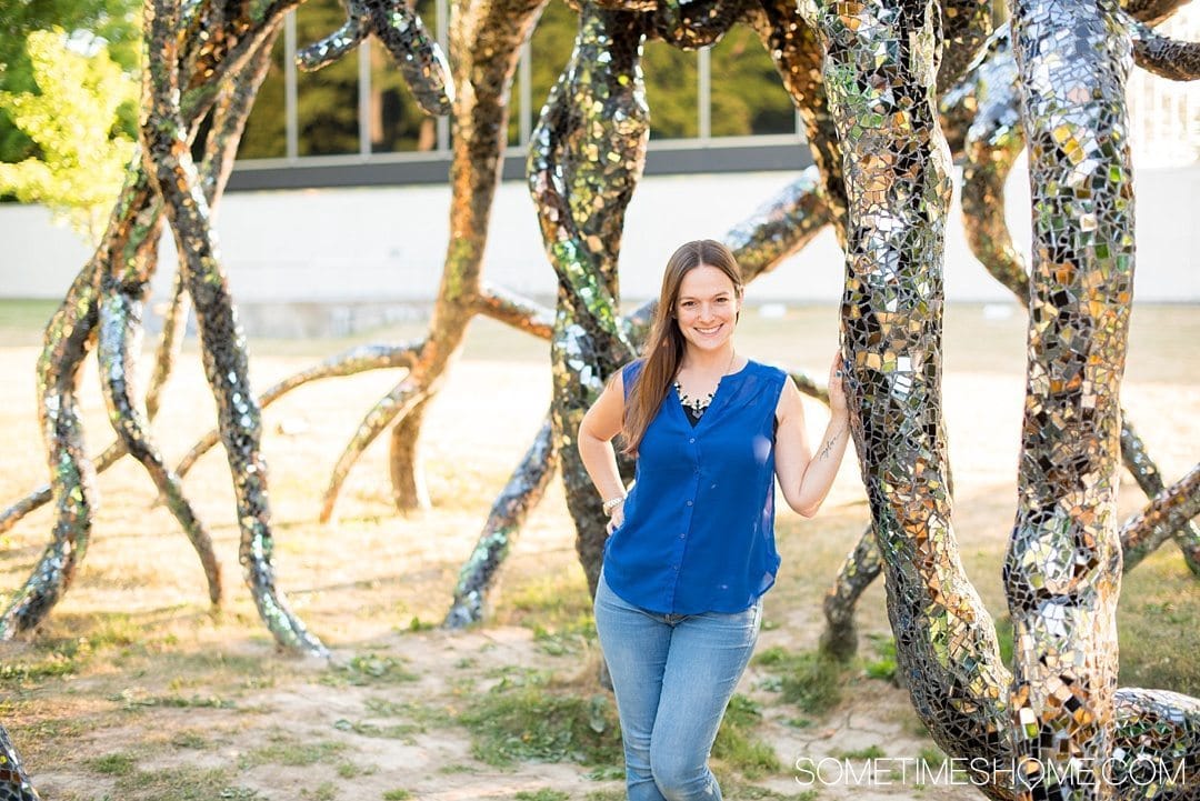 Why a Trip to Buffalo Had Me in Disbelief on Sometimes Home travel blog. Photo with a sculpture at the Albright Knox museum in the Buffalo state area on Elmwood Avenue.