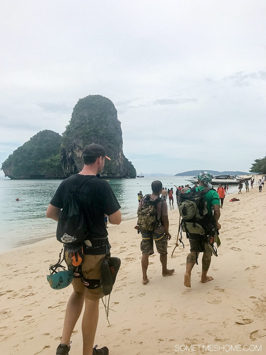 The BEST excursion we did in Thailand was a day rock climbing Phuket with an amazing guide. Our destinations were Krabi and Railay Beach on our day trip itinerary. Our adventure between the islands was a wonderful thing to do on a mid-size budget. Learn about our cost (for solo and couples) and see photography and more on Sometimes Home. #ThailandTravel #PhuketThailand #RailayBeach #KrabiBeach #RockClimbing #ThailandRockClimbing #ThingstodoinPhuket #ThaiBeaches #SoutheastAsiaTrip #RockClimbingThailand
