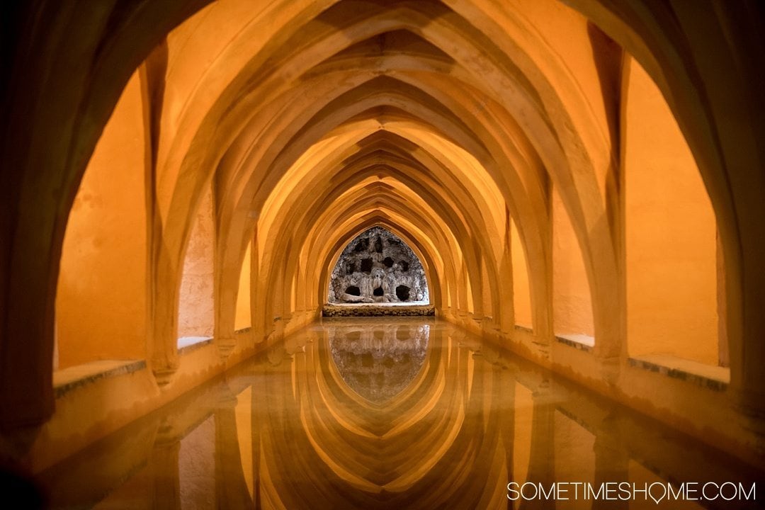 You Haven't Seen Seville Until You've Visited These 3 Sites, by Sometimes Home travel blog. Photo of Real Alcazar iconic baths.