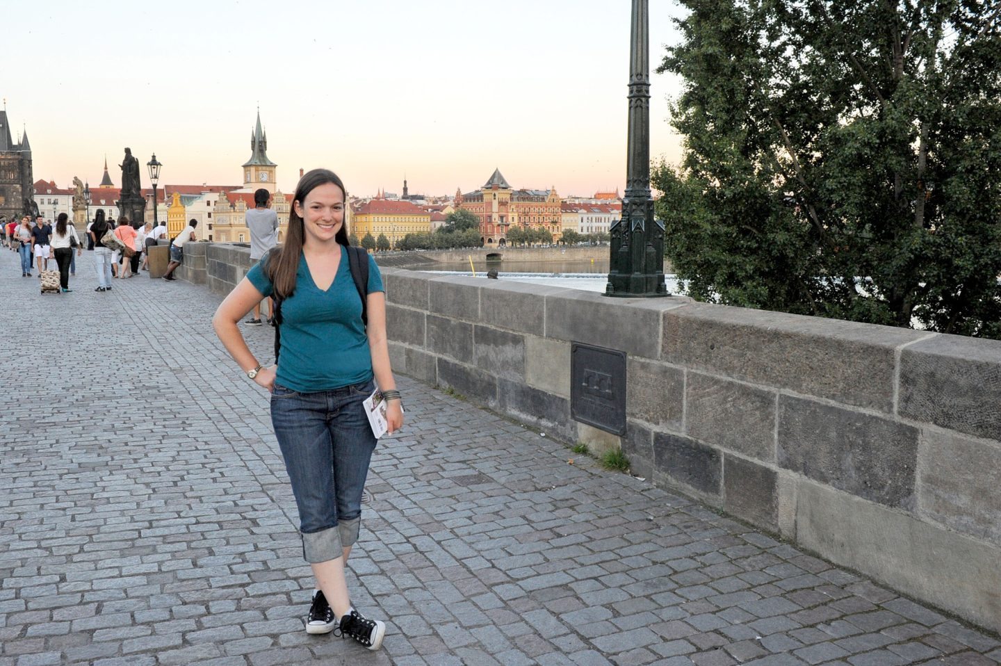 Why I Started Traveling Solo and You Should Too by Sometimes Home travel blog. Photo in Prague on the famous Charles Bridge.