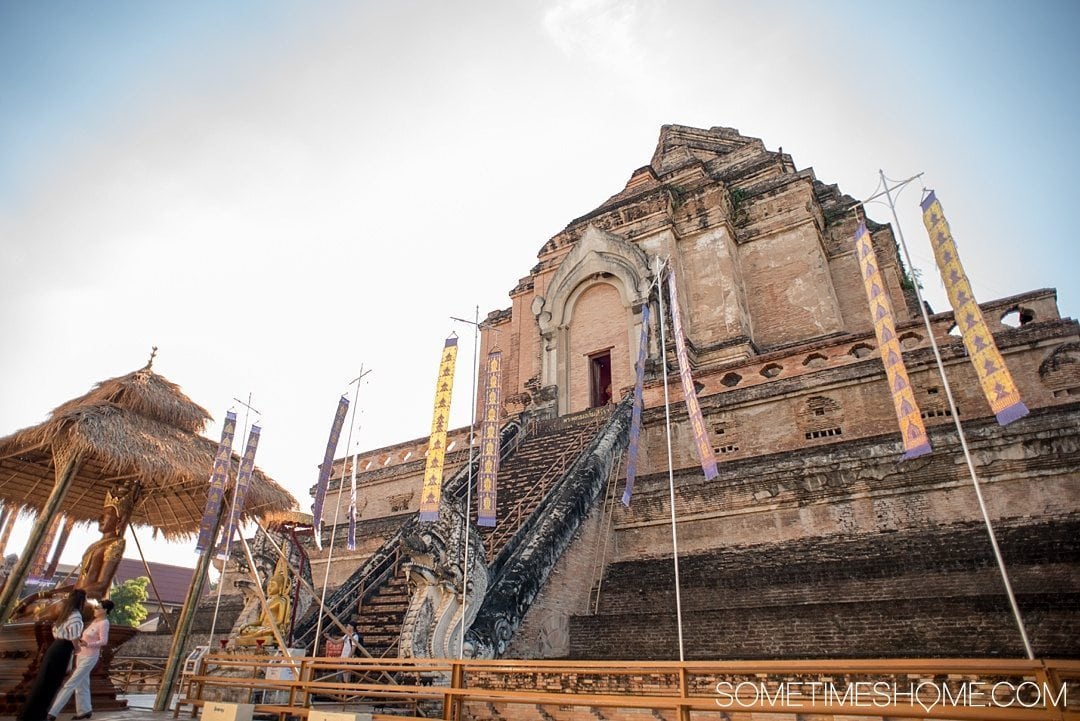 Fantastic Fall Destination Ideas Around the World on Sometimes Home travel blog. Picture of the old temple, Wat Chedi Luang, in Chiang Mai, Thailand by Mikkel Paige.