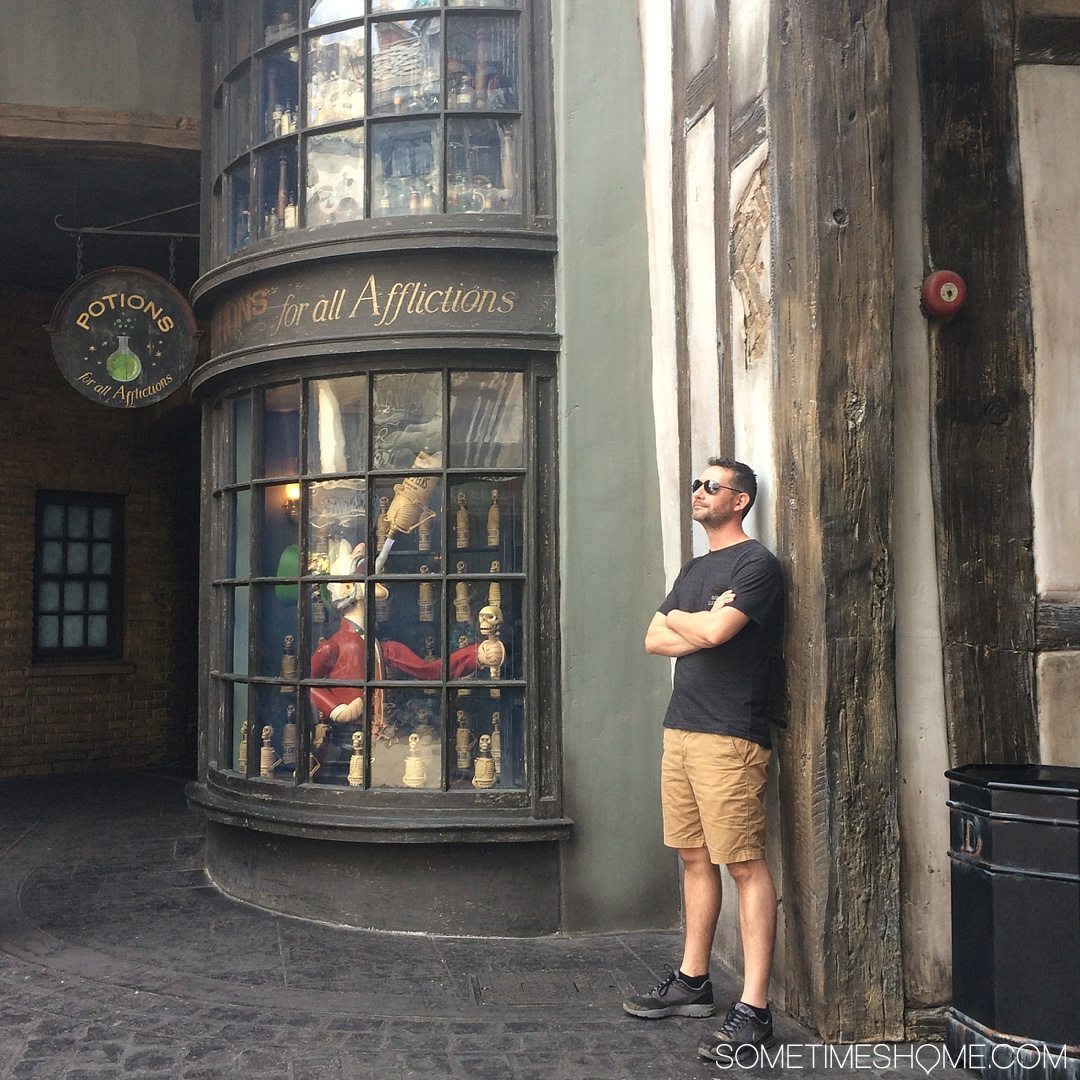 5 Mistakes to Avoid at the Wizarding World of Harry Potter in Orlando, Florida by Sometimes Home travel blog. Photo from the potions window in Diagon Alley.