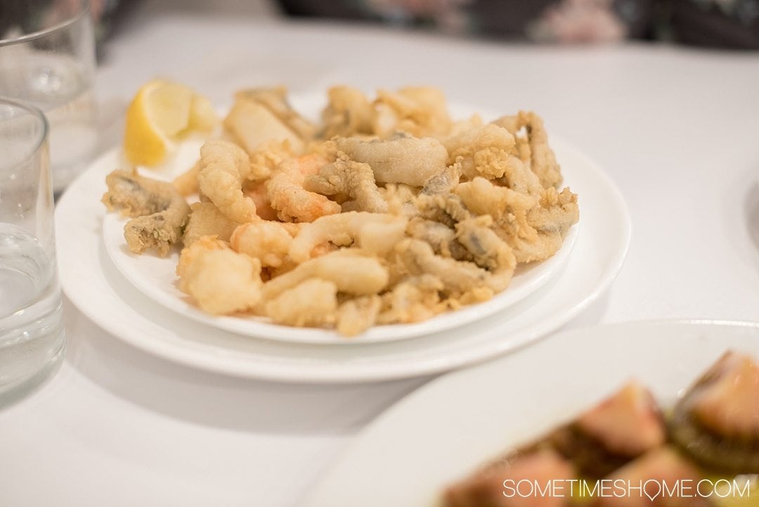 One Perfect Day in Granada Spain. Photos and itinerary on Sometimes Home travel blog. Picture of fried fish from Los Diamantes restaurant.