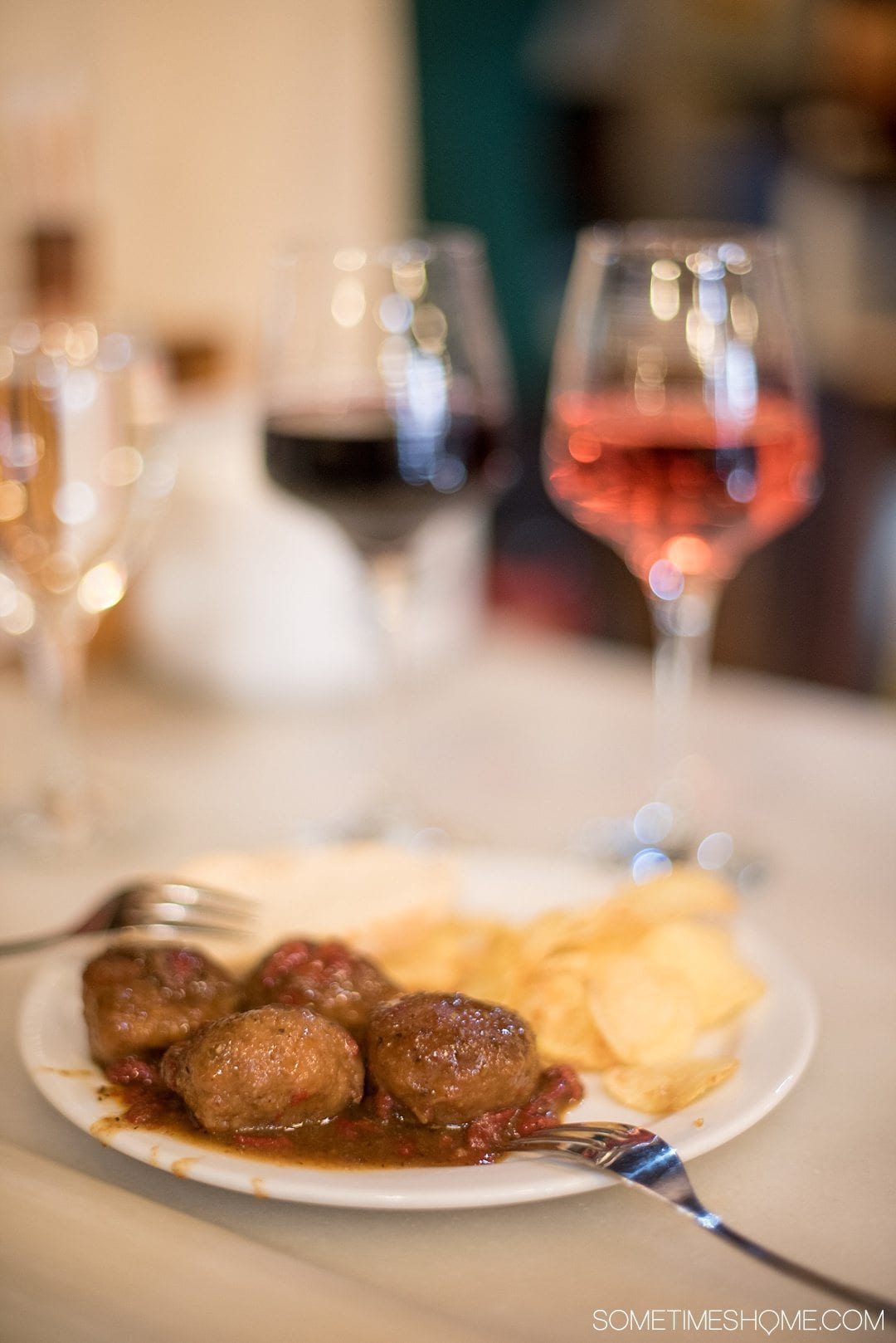 One Perfect Day in Granada Spain. Photos and itinerary on Sometimes Home travel blog. Picture of late night tapas.