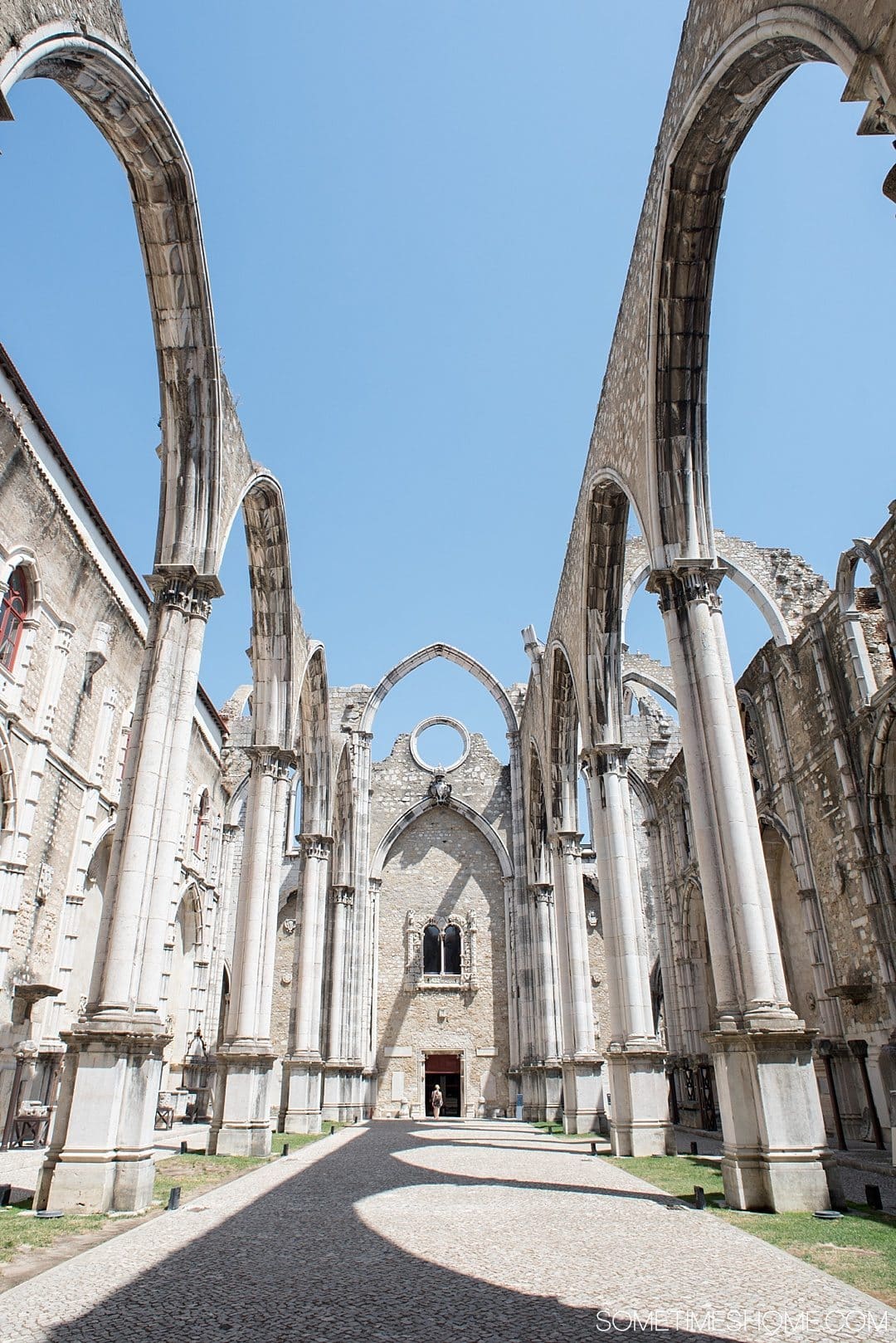 Why Lisbon is the Best City in Europe on Sometimes Home travel blog. Photo of Carmo Convent church ruins.