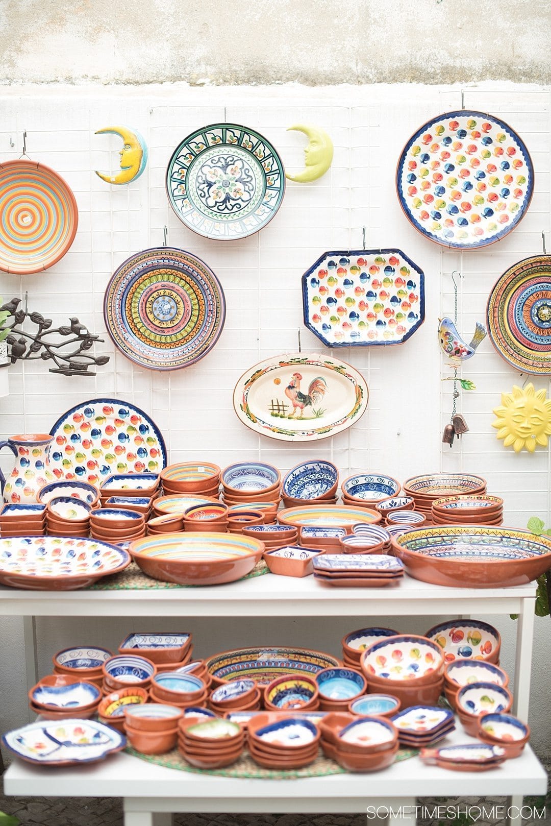 Why Lisbon is the Best City in Europe on Sometimes Home travel blog. Photo of hand painted pottery.