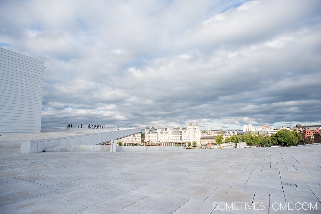 10 Not-to-Miss Sites in Oslo Norway by Sometimes Home travel blog. Photo of the view from on top of Oslo's Opera House roof.