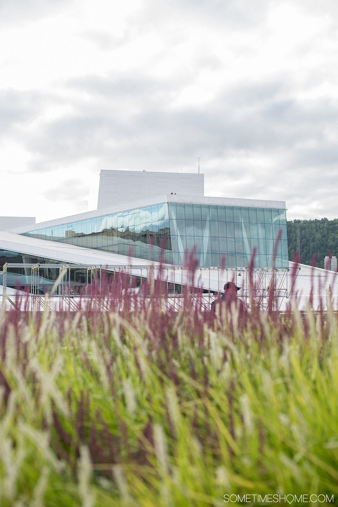 10 Not-to-Miss Sites in Oslo Norway by Sometimes Home travel blog. Photo of the view from on top of Oslo's Opera House roof.