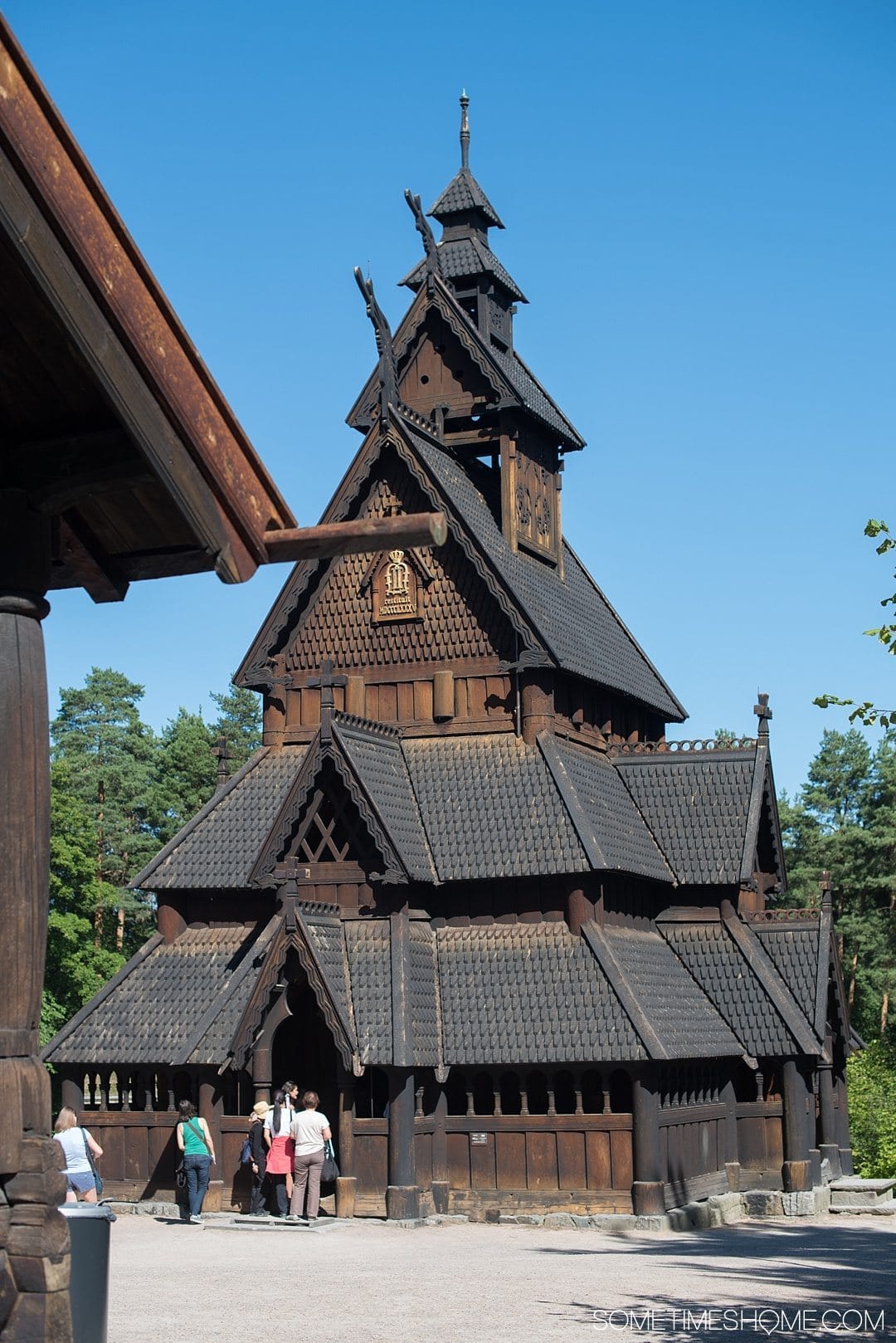 10 Not-to-Miss Sites in Oslo Norway by Sometimes Home travel blog. Photo of a stave church at Norsk Folkemuseum. 