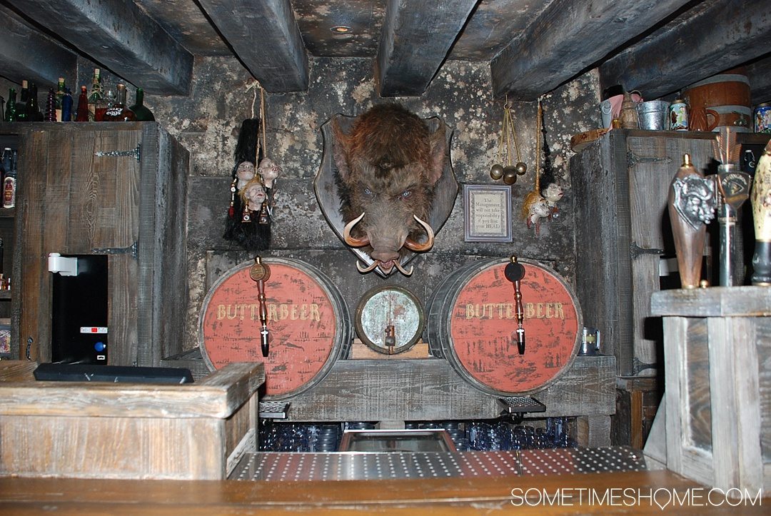 5 Mistakes to Avoid at the Wizarding World of Harry Potter in Orlando, Florida by Sometimes Home travel blog. Photo inside Hog's Head Pub.