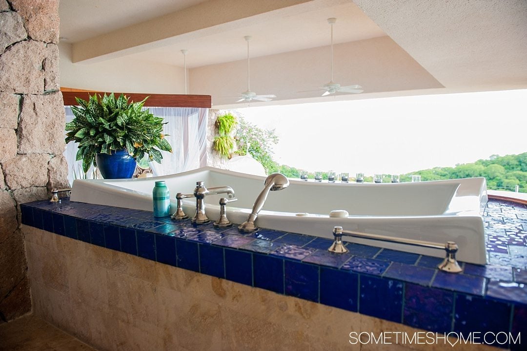 Your Questions Answered: Jade Mountain St. Lucia on Sometimes Home travel blog. Photo of bath tub in the Galaxy sanctuary suite.