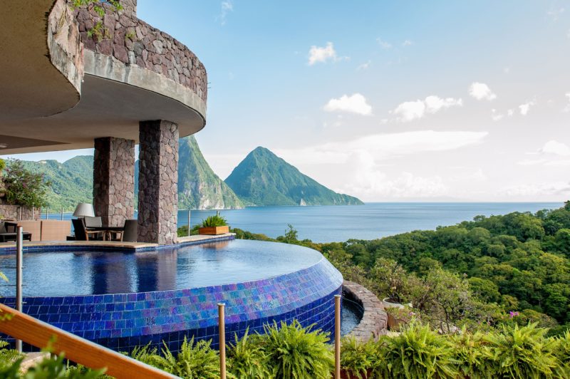 Your Questions Answered: Jade Mountain St. Lucia on Sometimes Home travel blog. Photo of the view of the Pitons and infinity pool from the Galaxy sanctuary suite.