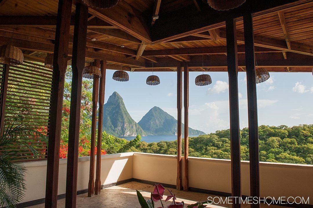 Your Questions Answered: Jade Mountain St. Lucia on Sometimes Home travel blog. Photo of a room at their sister resort Anse Chastanet with a view of the Pitons.