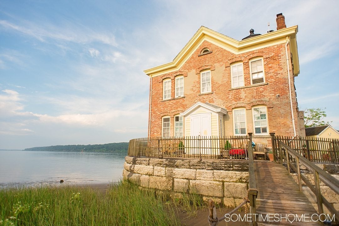 Your Complete Guide to Saugerties, New York on Sometimes Home travel blog. Photo of the Saugerties Lighthouse.