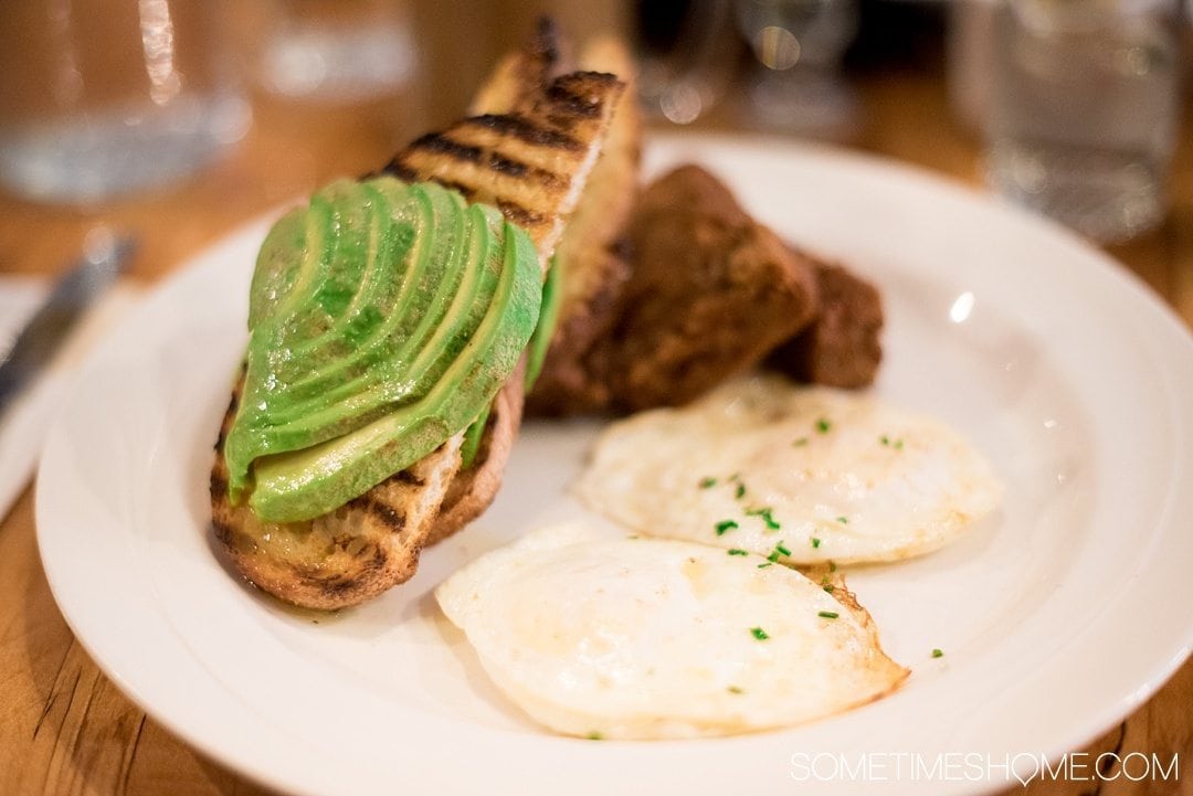 Your Complete Guide to Saugerties, New York on Sometimes Home travel blog. Photo of avocado breakfast at Love Bites Cafe.