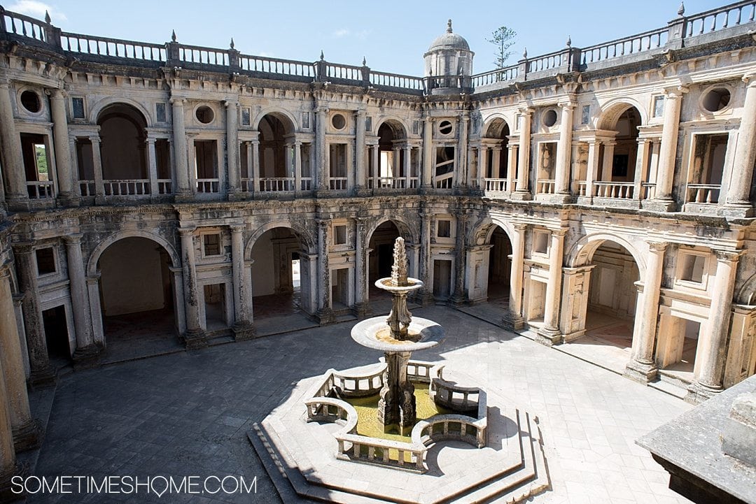 Amazing Day Trip from Lisbon to Tomar Portugal. Photos, tips and advice on Sometimes Home travel blog. Picture of the interior courtyard at Castelo de Tomar and Convent of Christ.