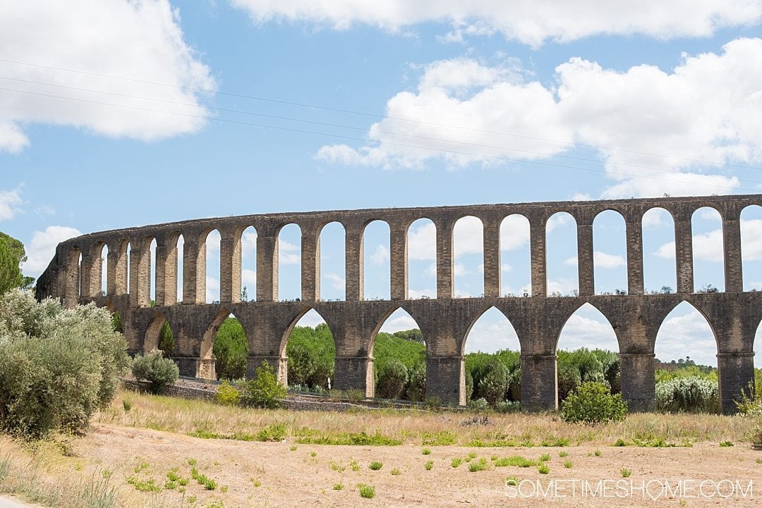 Amazing Day Trip from Lisbon to Tomar Portugal. Photos, tips and advice on Sometimes Home travel blog. Picture of Pegoes Aqueduct.