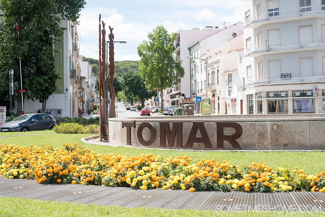 Day trip to Tomar, Portugal from Lisbon. Photos, tips and advice on Sometimes Home travel blog. Picture of the Tomar town sign.