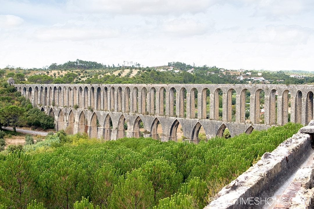 Amazing Day Trip from Lisbon to Tomar Portugal. Photos, tips and advice on Sometimes Home travel blog. Picture of Pegoes Aqueduct.