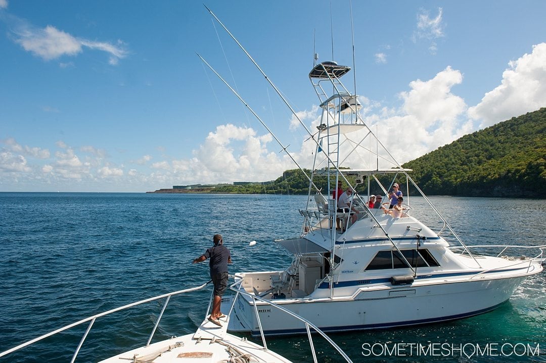 Must Do Activities to Revel In on Vacation in St. Lucia on Sometimes Home travel blog. Photos of a boat ride excursion.