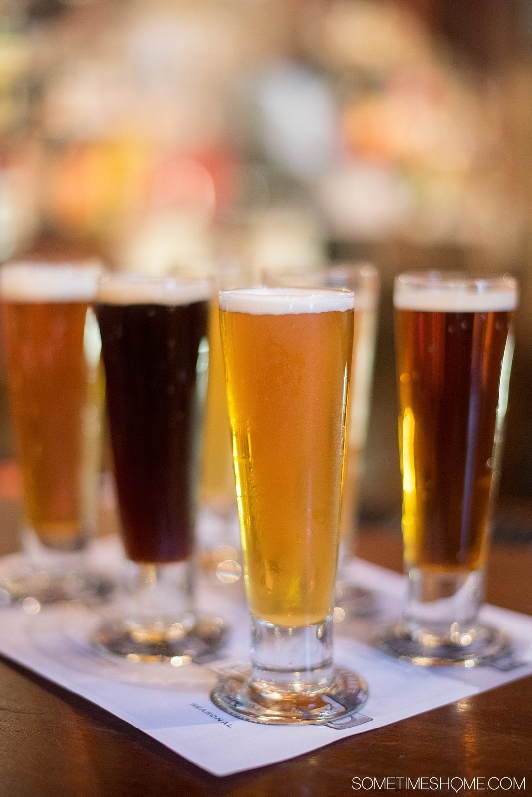 Things to do in Corning NY in the Finger Lakes region on Sometimes Home travel blog. Photo of a beer flight at Market Street Brewing downtown.