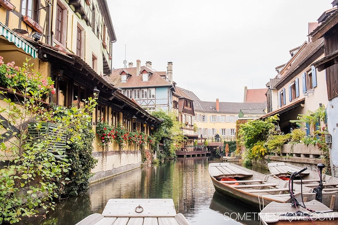 Tips and tricks to know visiting Colmar France with travel information and beautiful photography of this fairy tale village, particularly known for its Christmas markets during winter, in the Alsace region by Germany. #ColmarFrance #fairytalecity #AlsaceFrance