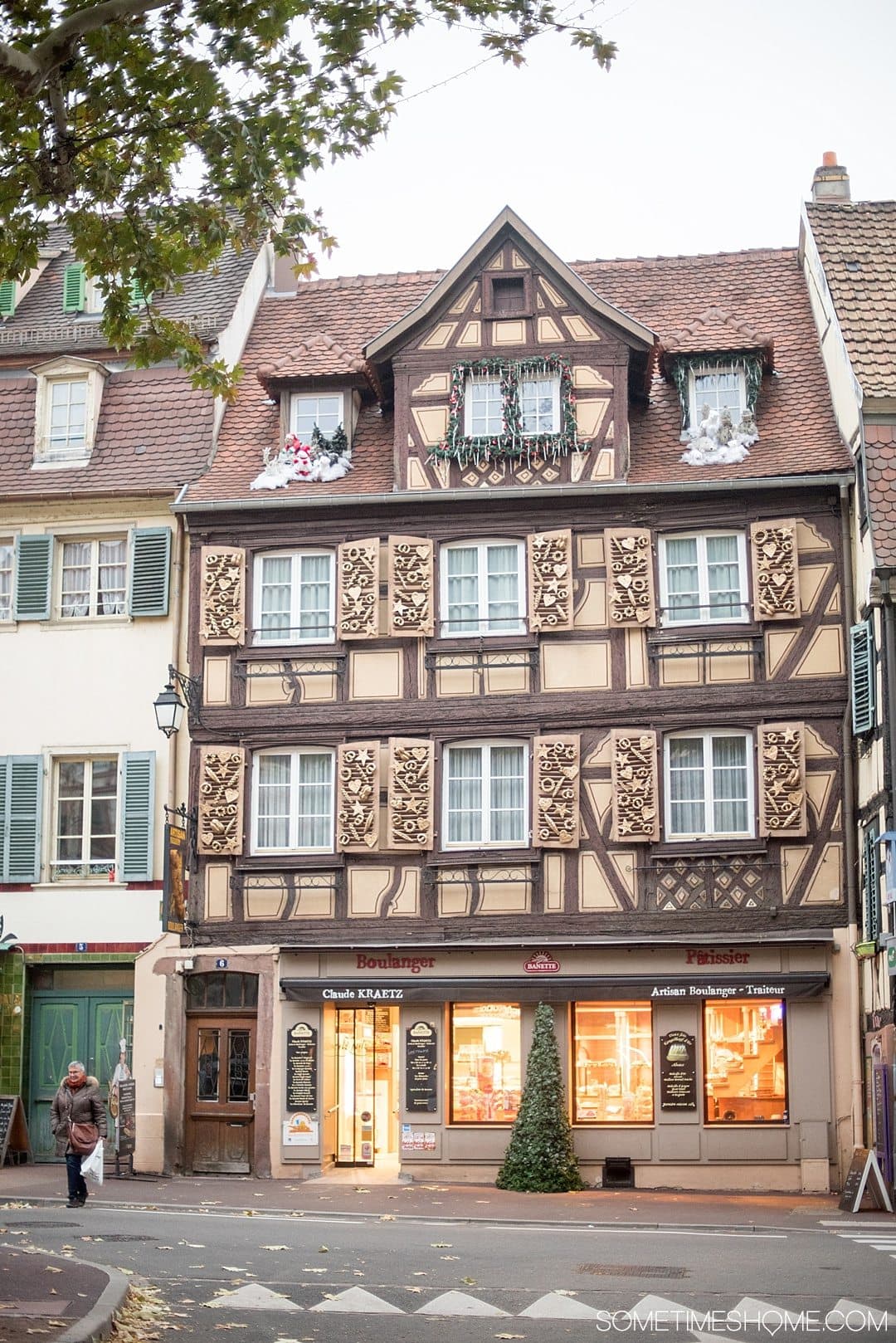 Tips and tricks to know visiting Colmar France with travel information and beautiful photography of this fairy tale village, particularly known for its Christmas markets during winter, in the Alsace region by Germany. #ColmarFrance #fairytalecity #AlsaceFrance