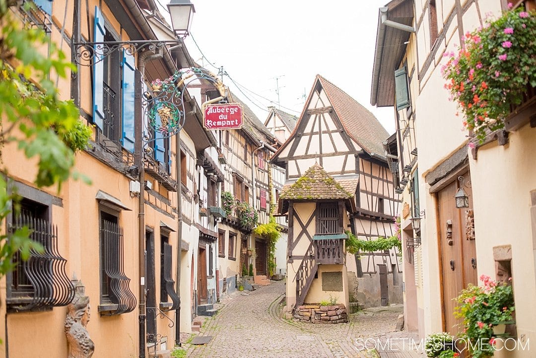 Tips and tricks to know visiting Colmar France with travel information and beautiful photography of this fairy tale village, particularly known for its Christmas markets during winter, in the Alsace region by Germany. #ColmarFrance #fairytalecity #AlsaceFrance