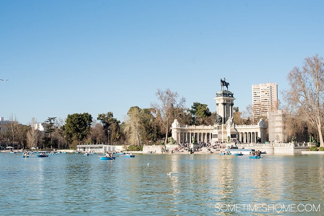 There are many things to do in Madrid, Spain. But people often wonder is one day enough in Madrid? We answer that question while showing you photography of this popular travel destination. From art, to food, and architecture attractions we have all the tips covered on Sometimes Home! This park view is worth a visit so click through for all the info! #Madrid #MadridSpain #SpanishFood #artmuseums #tapas #retiropark