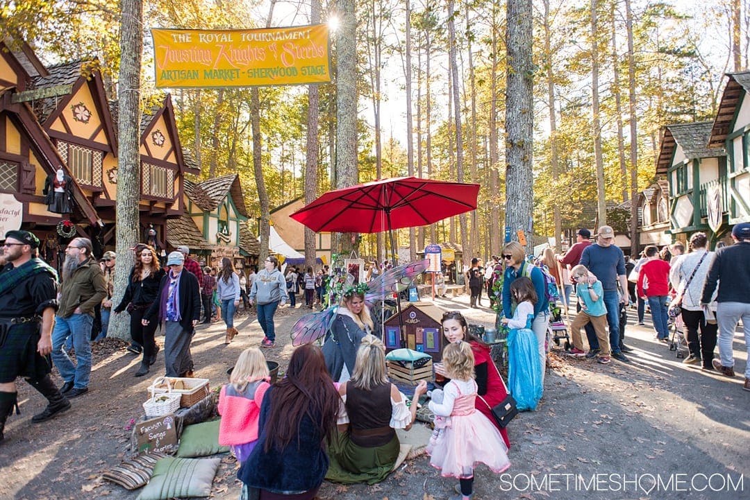 If you love theme parks and themed entertainment you'll love the North Carolina Renaissance Festival, associated with the Arizona location as well. Sometimes Home travel website has insider Q&A and information behind-the-scenes. Click through for pictures of the costumes and sets, food menu, drinks and beer, hairstyles, musicians, art and flower crowns and crafts! #RenaissanceFestival #VisitNC #NorthCarolianRenaissanceFestival #Renaissance #themedentertainment #sometimeshome