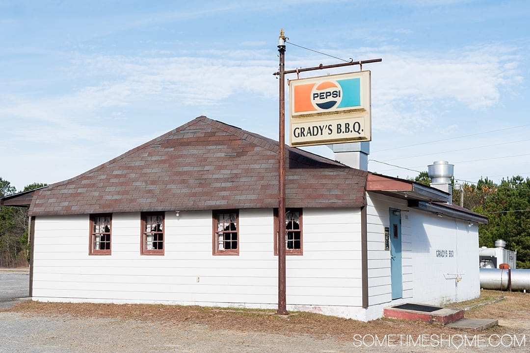 Goldsboro NC BBQ is a force to be reckoned with! The eastern vinegar based sauce of barbecue in this United States region can be sampled at a variety of restaurants, on pork, chicken, turkey or more. These restaurants have rubs to delight your taste too. Check out our article about the best places to try these southern delicacy recipes on delicious meats. #NCBBQ #barbecue #BBQ #northcarolina #GoldsboroNC #sometimeshome #vinegarBBQ #gradysbbq