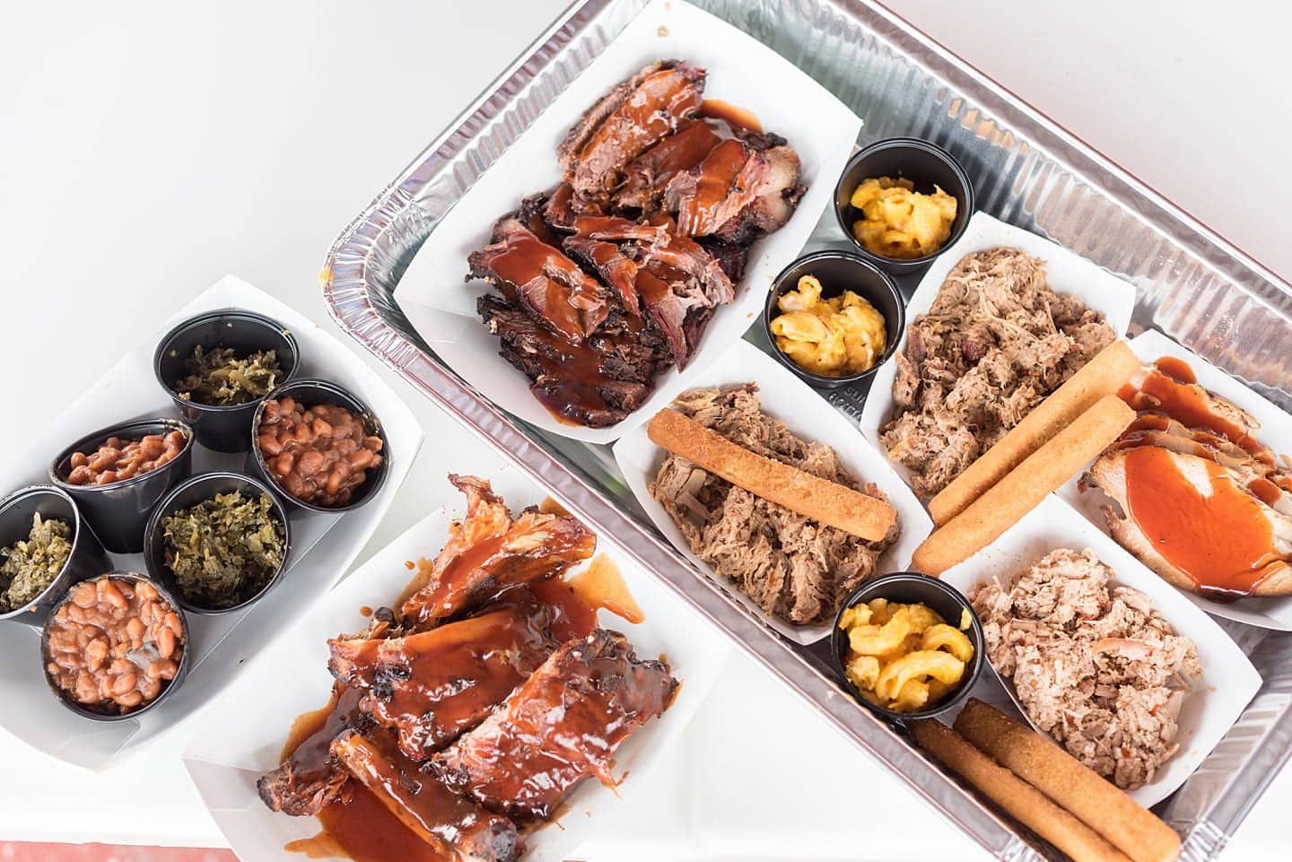 Goldsboro NC BBQ is a force to be reckoned with! The eastern vinegar based sauce of barbecue in this United States region can be sampled at a variety of restaurants, on pork, chicken, turkey or more. These restaurants have rubs to delight your taste too. Check out our article about the best places to try these southern delicacy recipes on delicious meats. #NCBBQ #barbecue #BBQ #northcarolina #GoldsboroNC #sometimeshome #vinegarBBQ