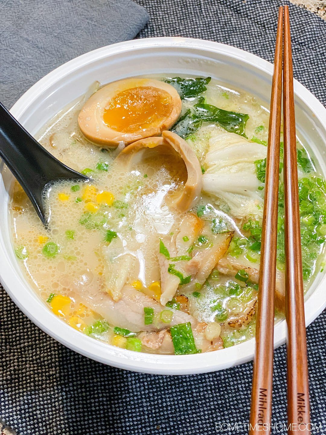 Bowl of ramen soup with chopsticks on the right for the Best Soups in Raleigh.