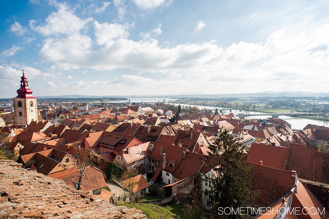 Ptuj Slovenia is a beautiful travel destination for your vacation in Slovenia. Our photography of this centuries old town with roots in the Stone Age, including architecture and nature, will inspire you to stop here on your roadtrip itinerary to see the sites, meet the people and experience the culture. #Sometimesome #Ptuj #Slovenia