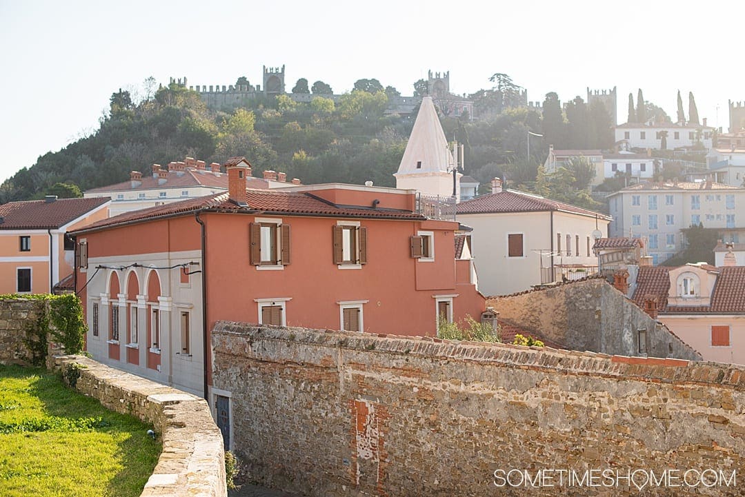 Travel to this city and read our our favorite things to do in Piran, Slovenia, a beautiful coastal town on the Adriatic Sea. You'll love watching the sunrise and sunset from the beach or your hotel, trying the food, its European squares and photography opportunities. #Sometimesome #Piran #Slovenia #AdriaticCoast #AdriaticSea