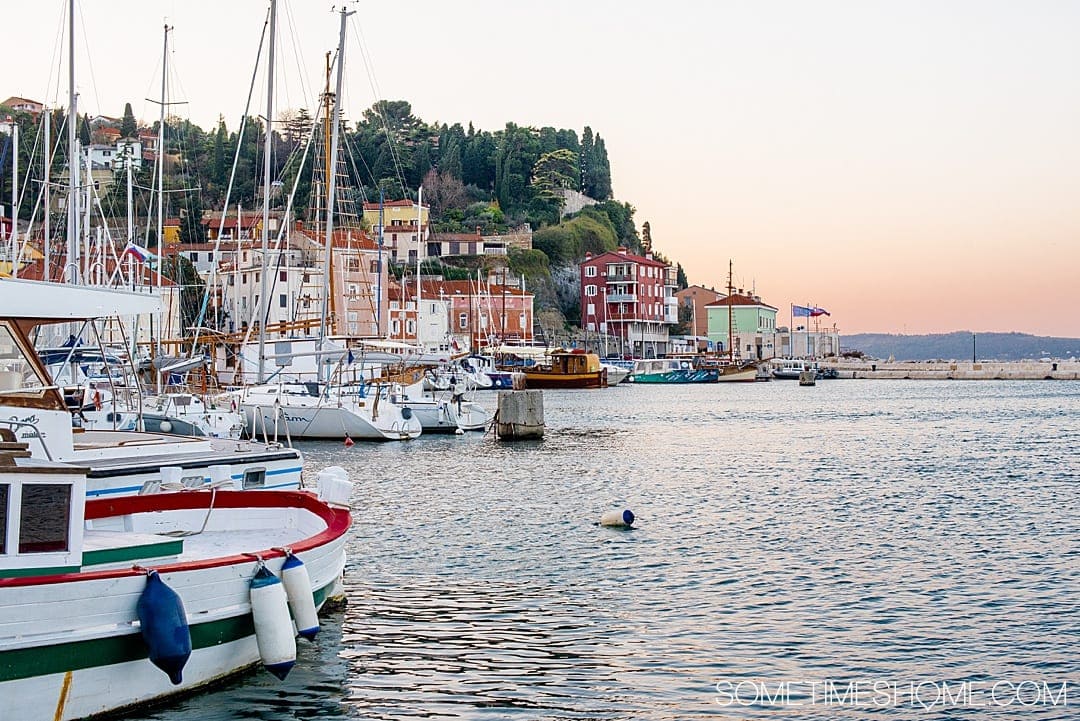 Travel to this city and read our our favorite things to do in Piran, Slovenia, a beautiful coastal town on the Adriatic Sea. You'll love watching the sunrise and sunset from the beach or your hotel, trying the food, its European squares and photography opportunities. #Sometimesome #Piran #Slovenia #AdriaticCoast #AdriaticSea