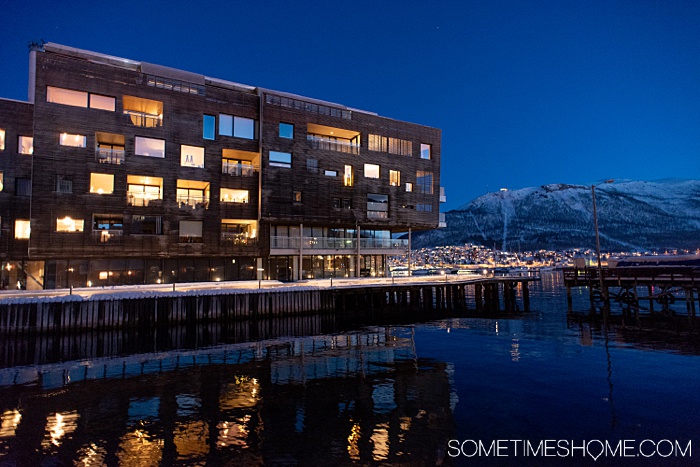 Tromso winter photos that will inspire you to travel to northern Norway during January or February. See bucket list things like Aurora Borealis (the Northern Lights), or participate in tours and things to do like feeding reindeer and taking a beautiful sleigh ride in the snow. #northernlights #sometimeshome #auroraborealis #reindeerfeeding #sleighride #tromsonorway #norway #tromsoinfebruary #tromsonorwayphotography