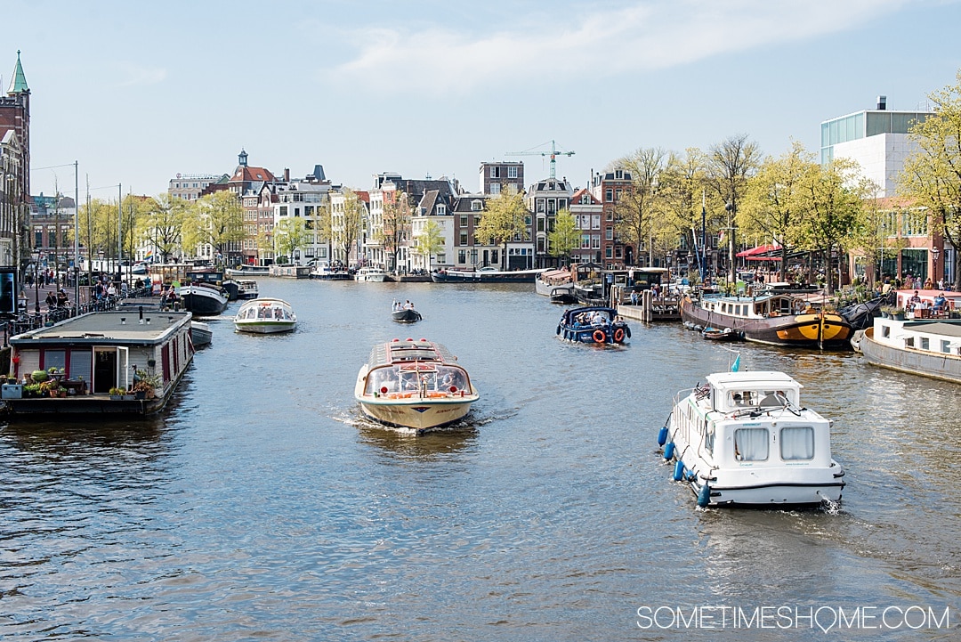 Amsterdam river cruise in The Netherlands and beautiful Belgium with tulips in bloom and a lot of charming European port cities to visit you wouldn't otherwise think of. We traveled with Emerald Waterways for 8 days of destinations and exploring in Europe day and night, with adventure to explore on the ships and in each city. #SometimesHome #SometimesHomeEurope #AmsterdamRiverCruise #EuropeanRiverCruise #AmsterdamTulips 