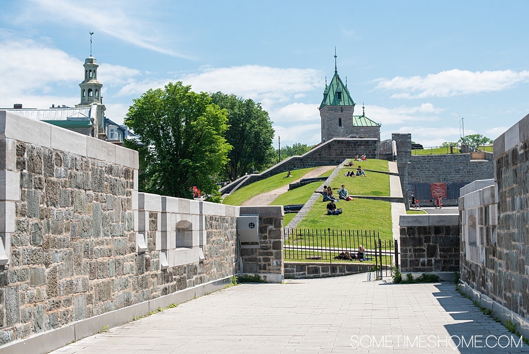 Things to do and see in Quebec City in 24 hours, in Canada. This French-speaking province is packed with history and beautiful city scenes. From a hotel that looks like a castle, to Instagram-worthy travel photography locations (including a garden and parliament) to a food store from the 1800s! #quebeccite #quebeccity #sometimeshome #Canada