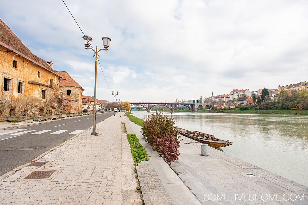 Maribor wine, the oldest vine and more things to do in this European city, whether it's winter, spring summer or fall. One of the prettiest cities in Slovenia has great food, drinks and important world history, including medieval walls and a castle and WWII history. #SometimesHome #WineTown #Maribor #Slovenia #OldestVine #MariborWine