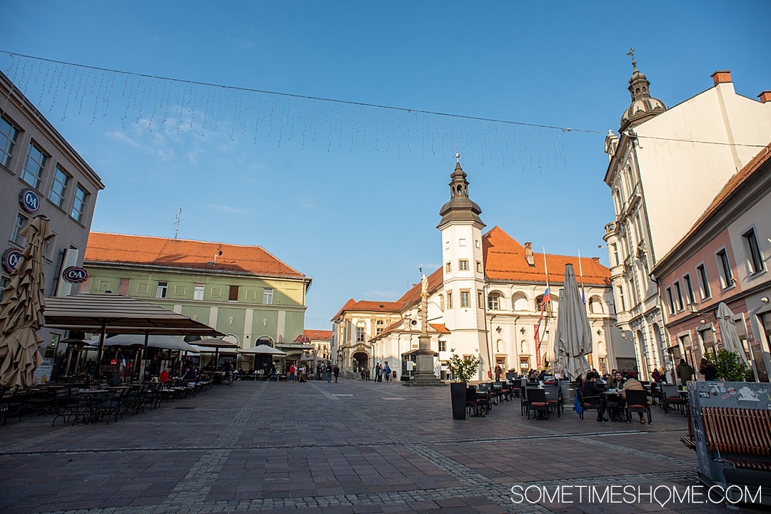 Maribor wine, the oldest vine and more things to do in this European city, whether it's winter, spring summer or fall. One of the prettiest cities in Slovenia has great food, drinks and important world history, including medieval walls and a castle and WWII history. #SometimesHome #WineTown #Maribor #Slovenia #OldestVine #MariborWine