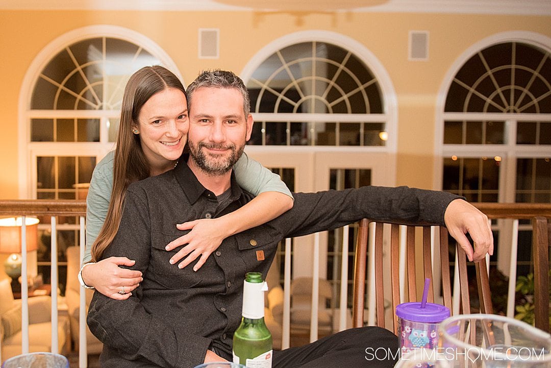 Photo of a couple at home as part of an article for date ideas during social distancing.